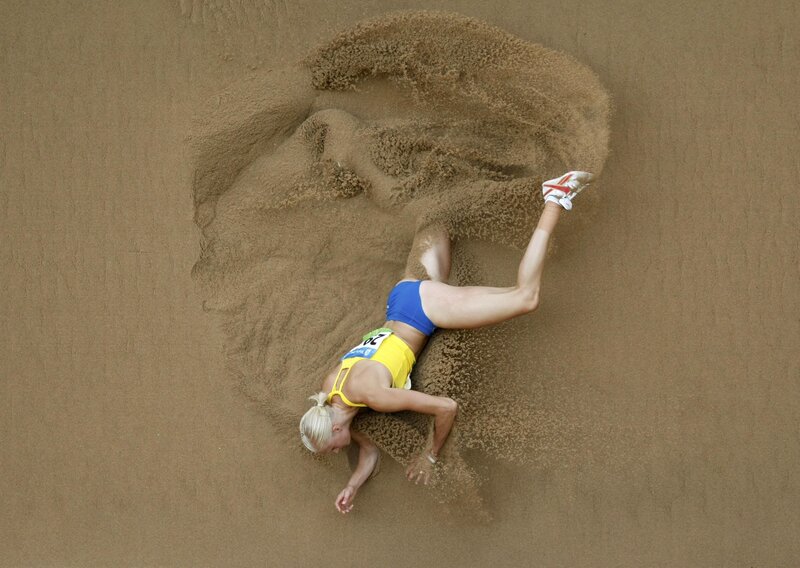 Athlete in Sand Pit — Brown, Dynamic