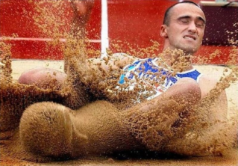 Athlete in Sand Pit — Brown