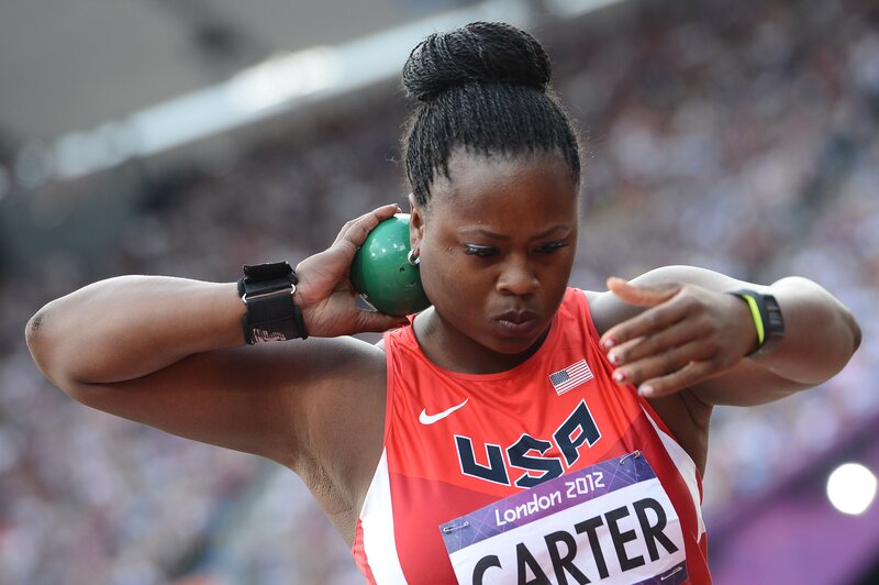 Athlete preparing to throw shot put
