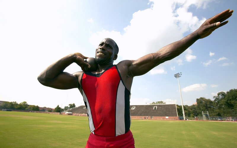 athlete preparing to throw shot put