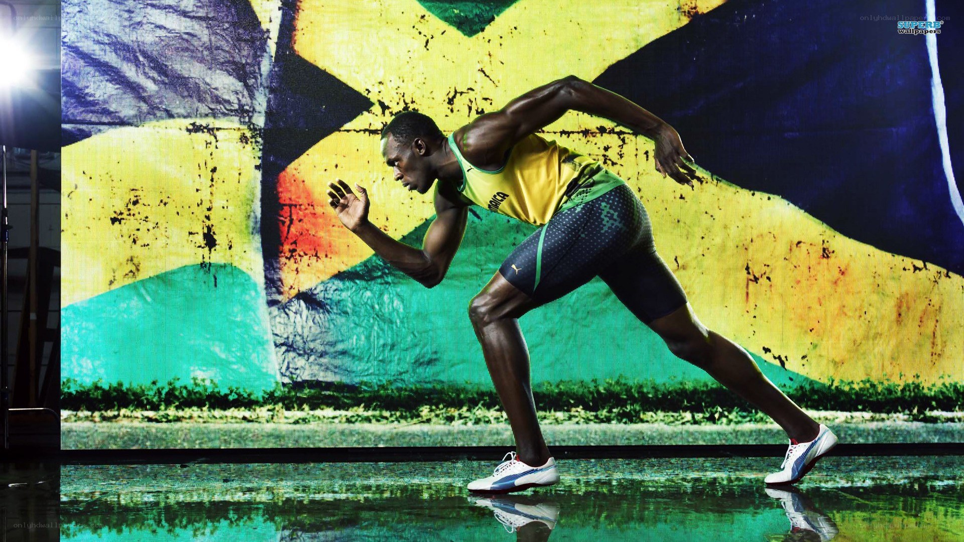 athlete running on track