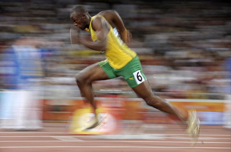 Athlete Running on Track — Yellow, Dynamic, Photograph