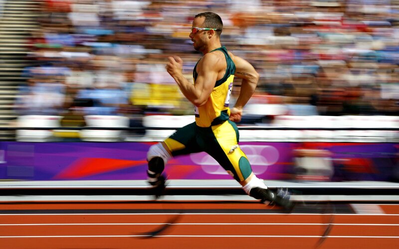 Athlete Running on Track — Yellow