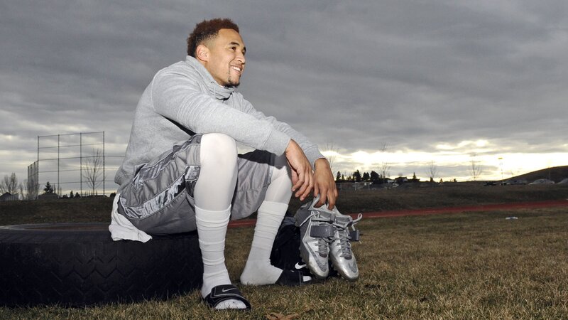 athlete sitting on tire