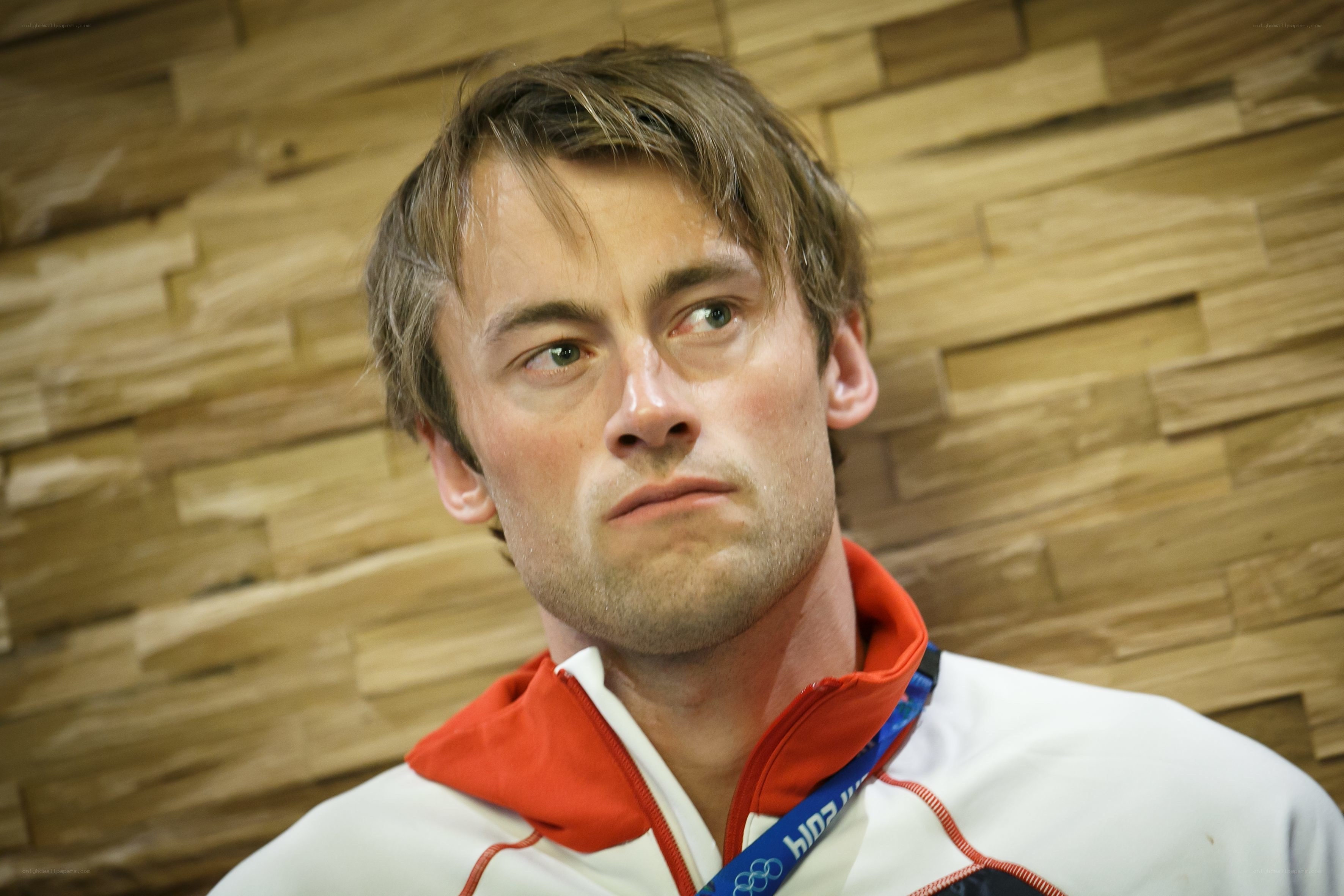 athlete with medal around neck