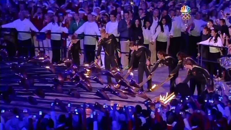 Athletes Lighting Torches