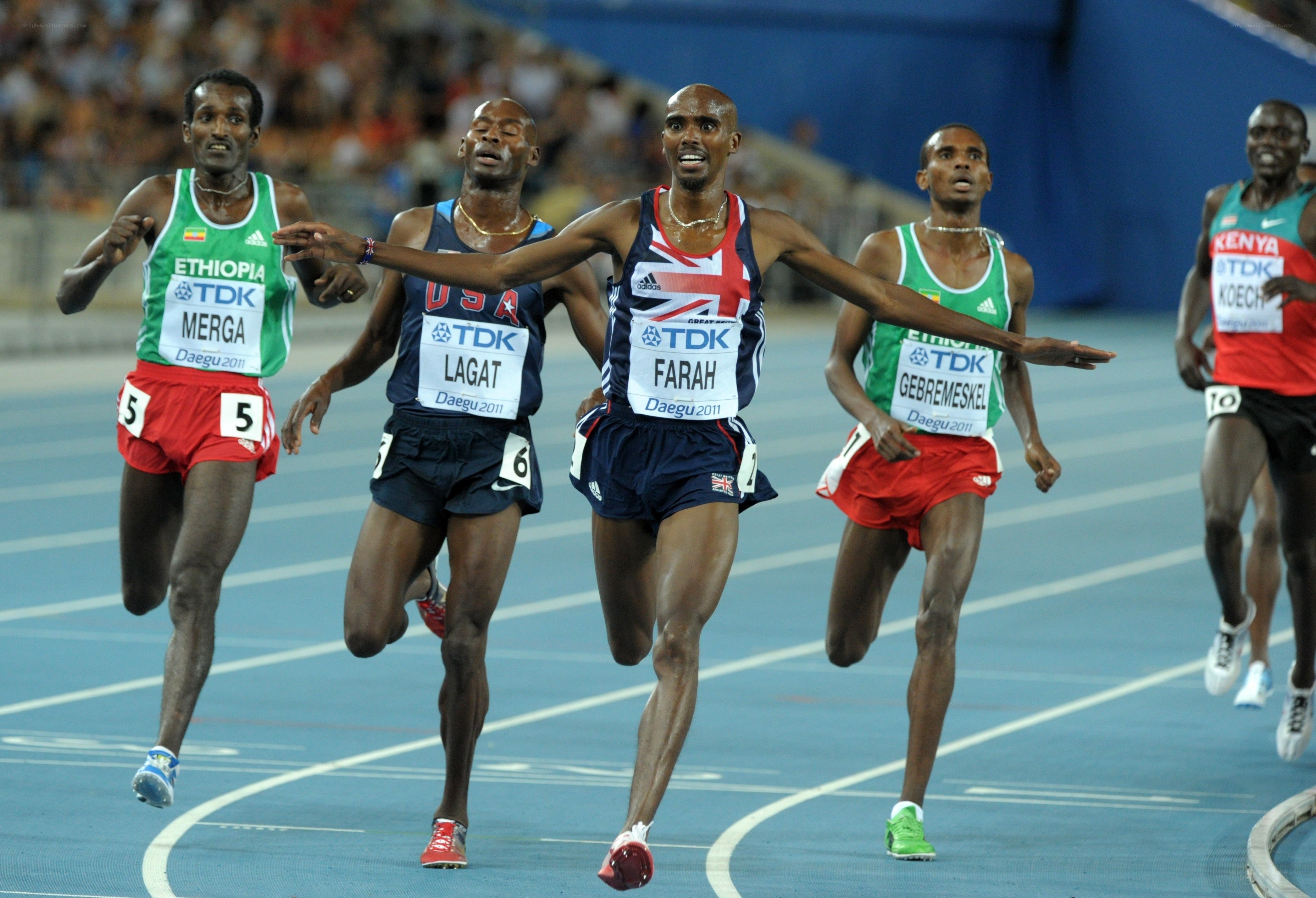 Athletes racing on a track