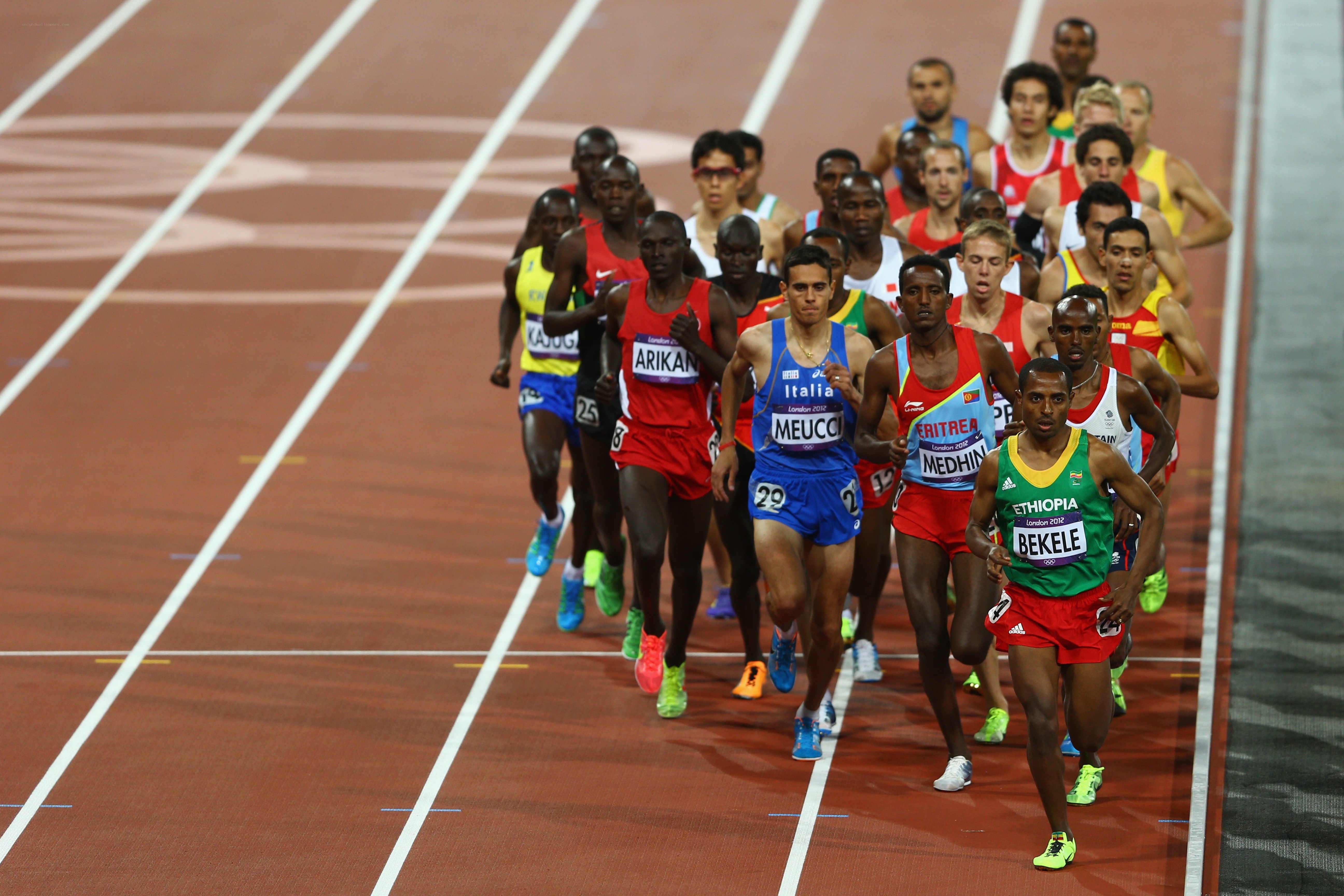 Athletes running on a track