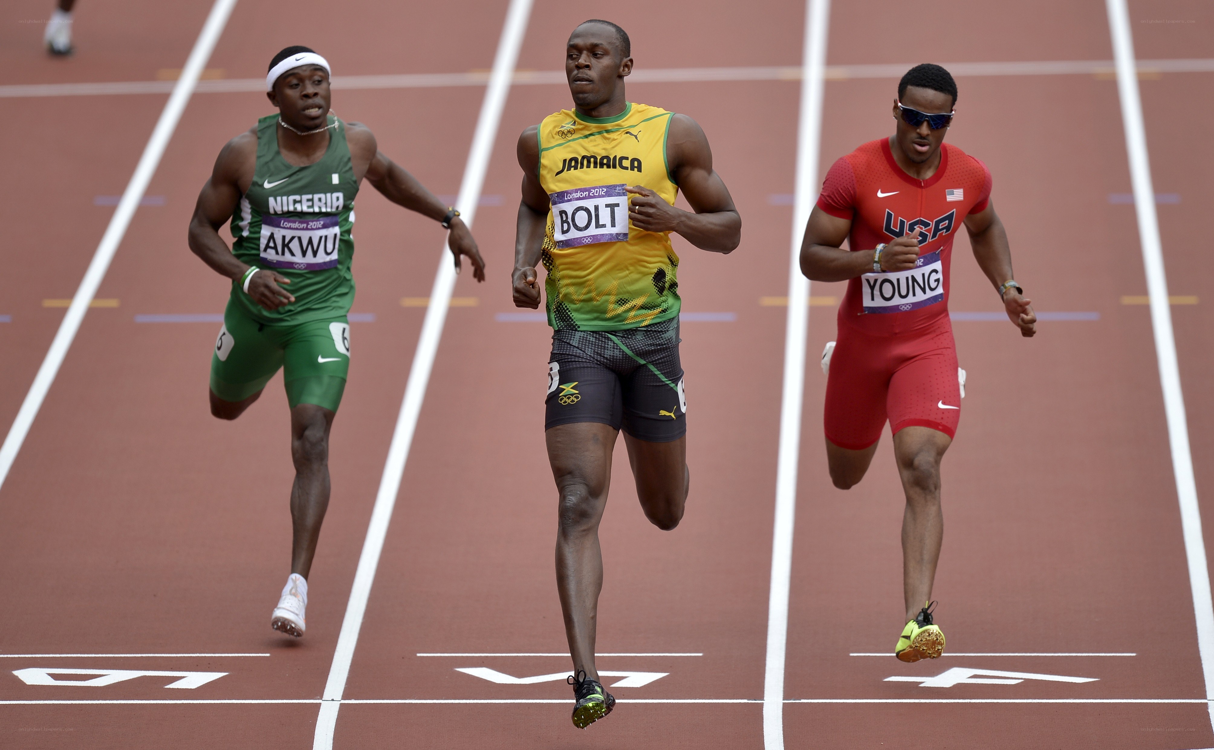 Athletes running on a track