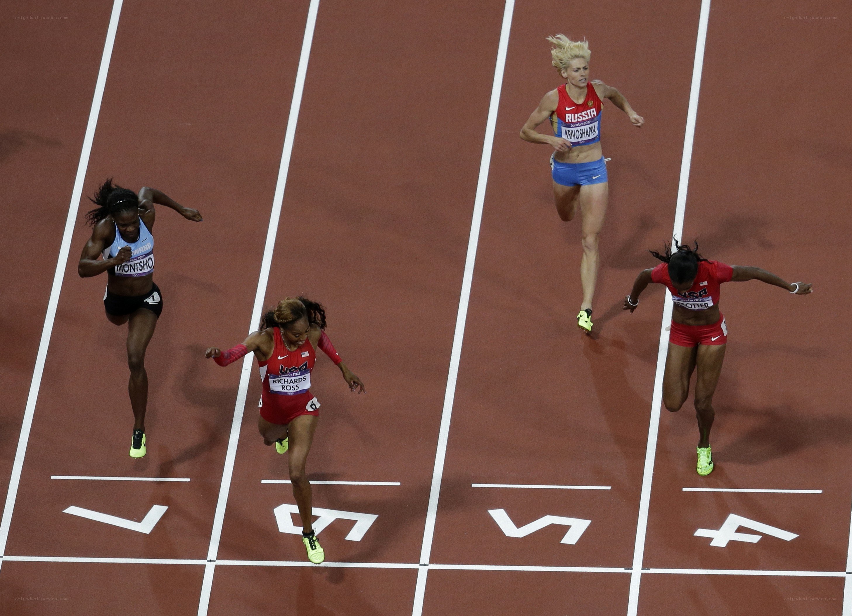 Athletes running on a track