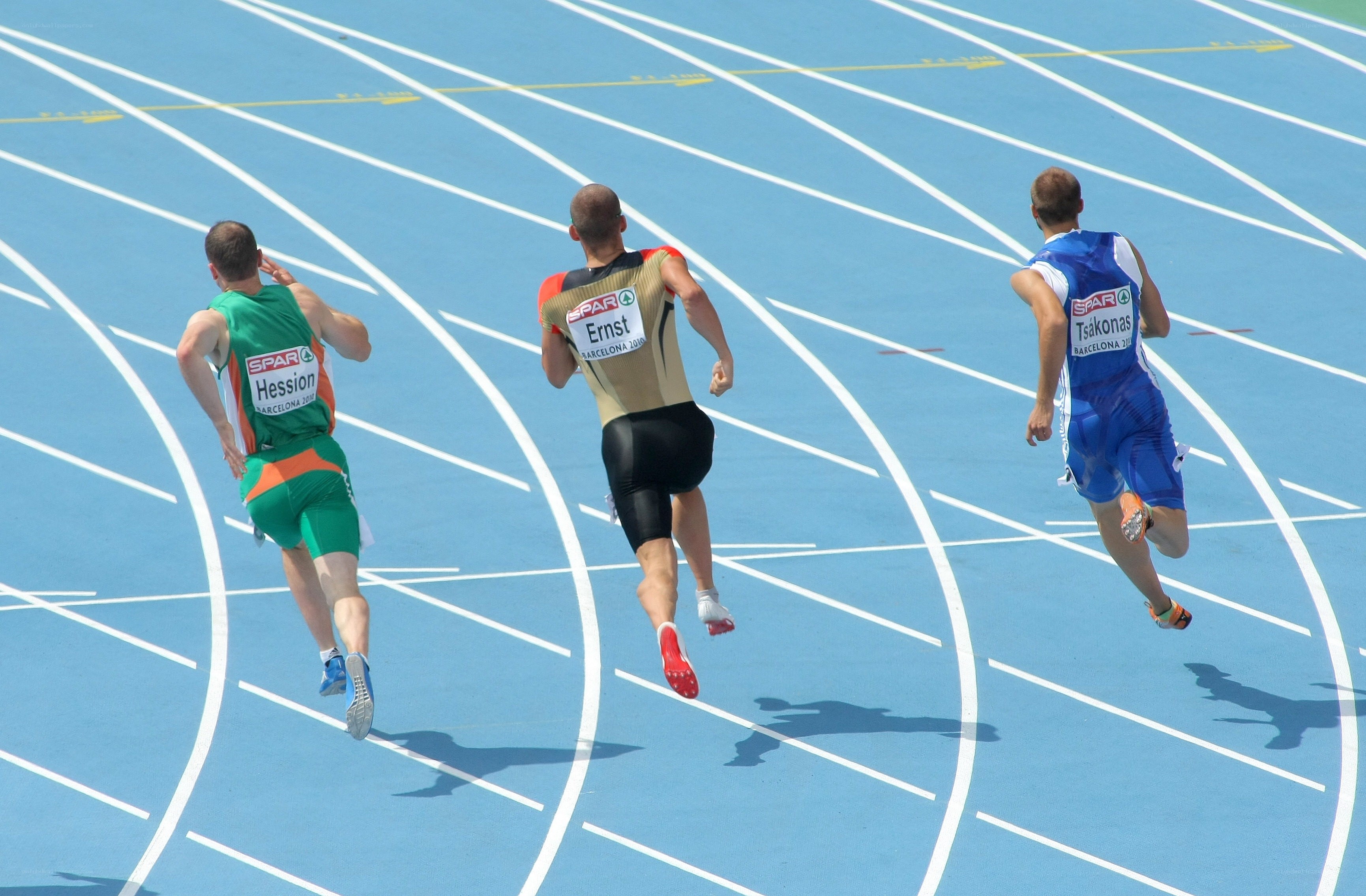 Athletes running on a track