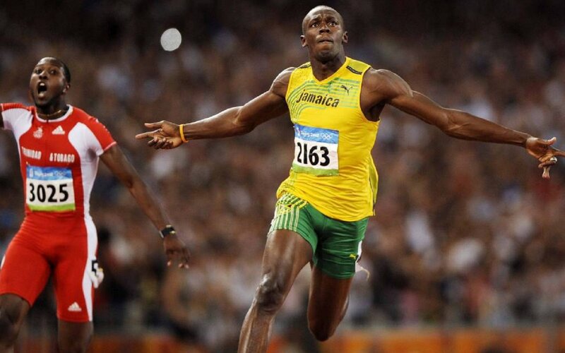 Athletes Running on Track — Yellow