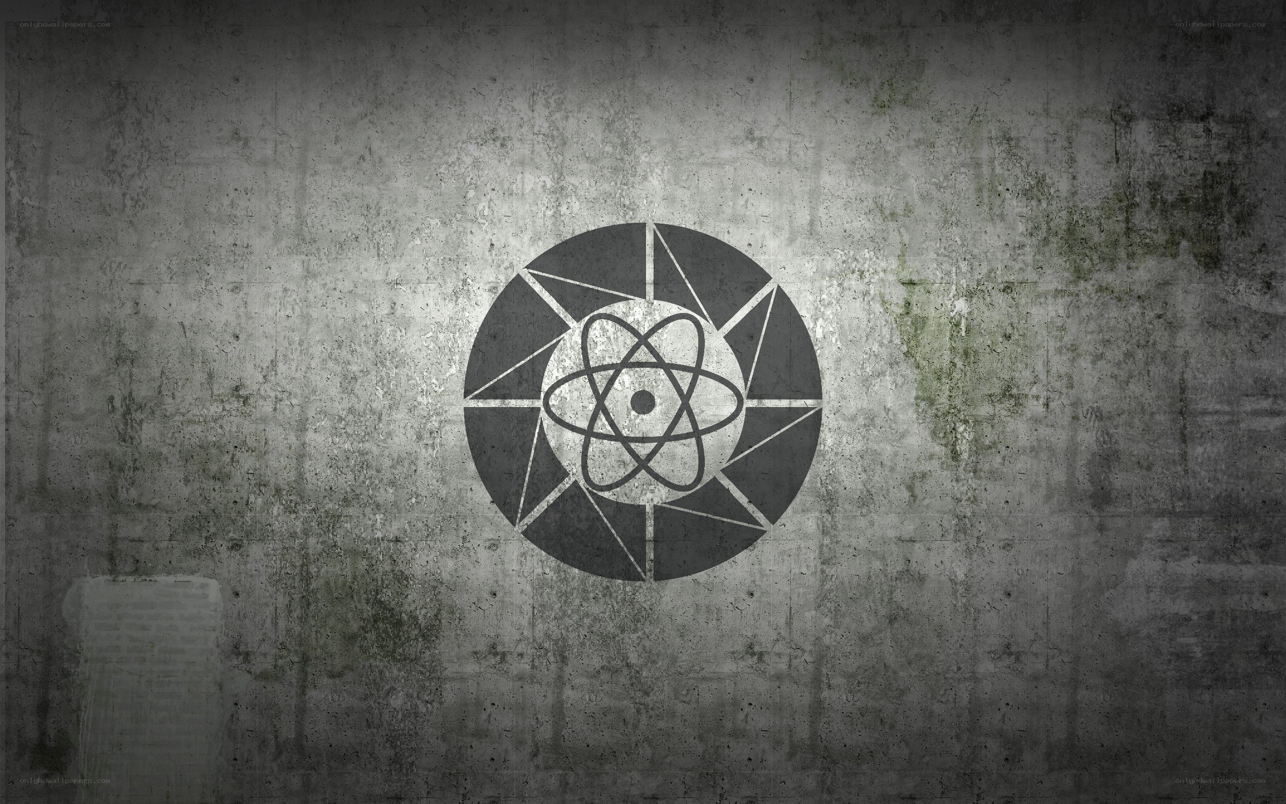 atomic symbol on concrete wall