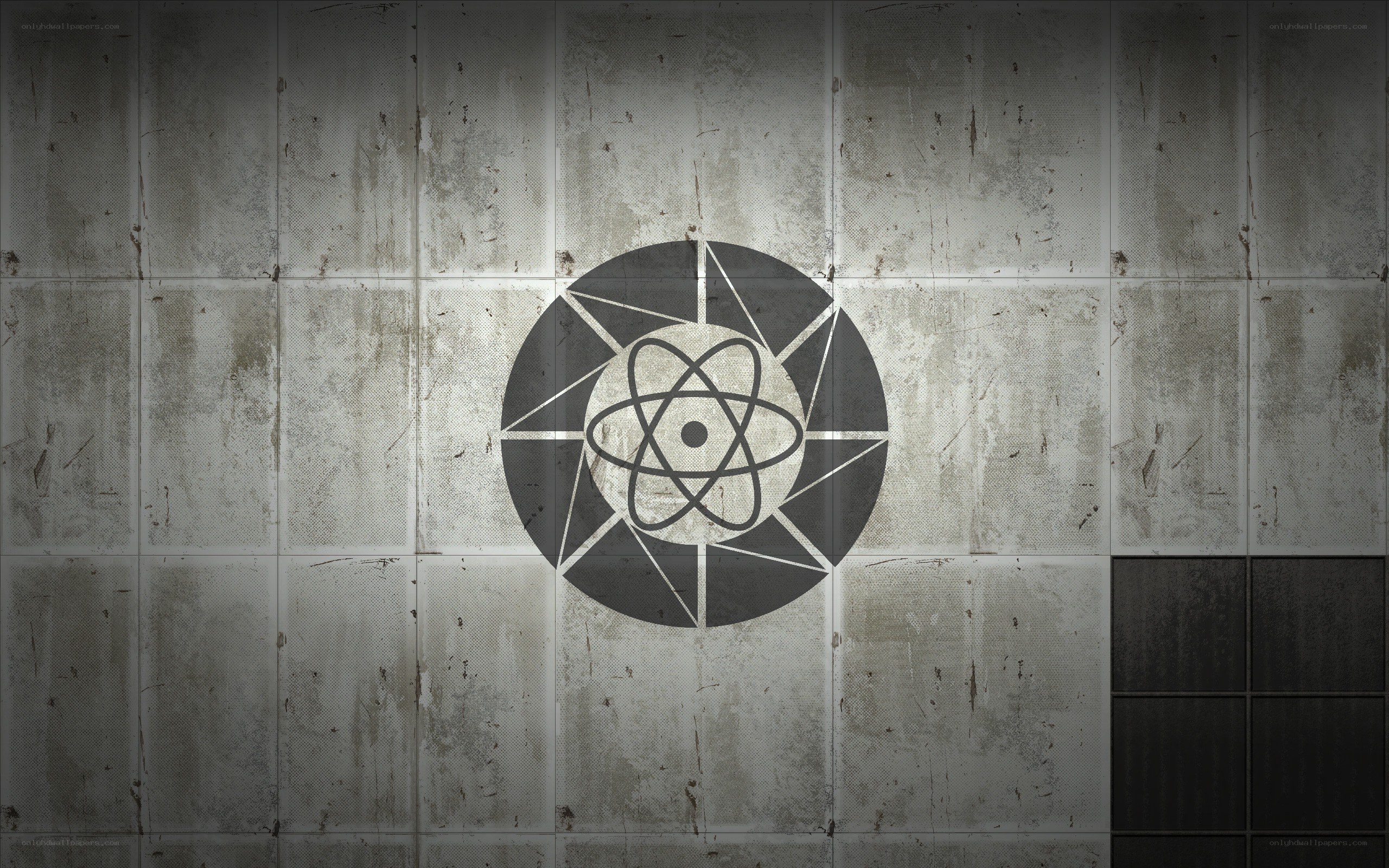 atomic symbol on concrete wall