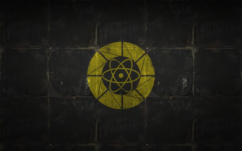 Atomic symbol on dark wall