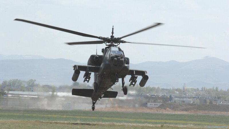 Attack Helicopter in Flight — Green, Dynamic, Afternoon