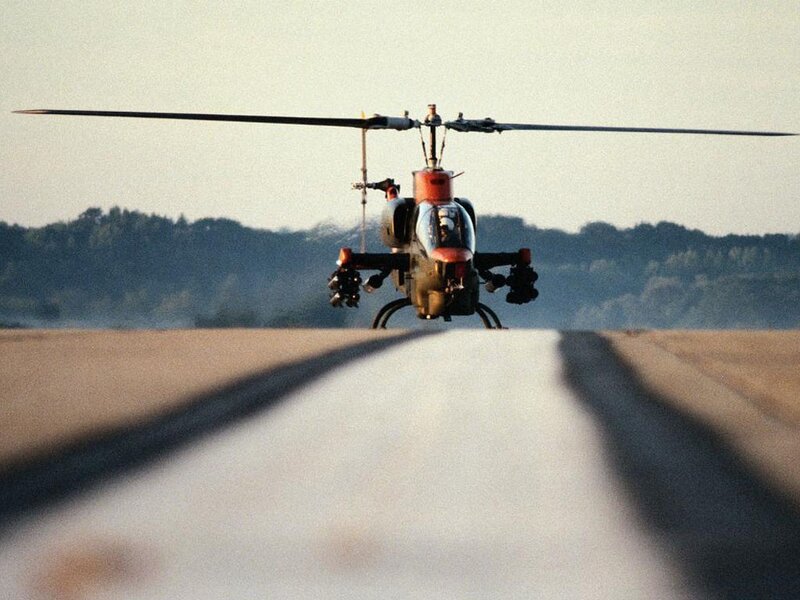 Attack Helicopter on Runway — Gray, Dramatic