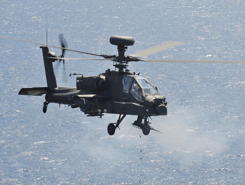 Attack Helicopter over Water — Gray