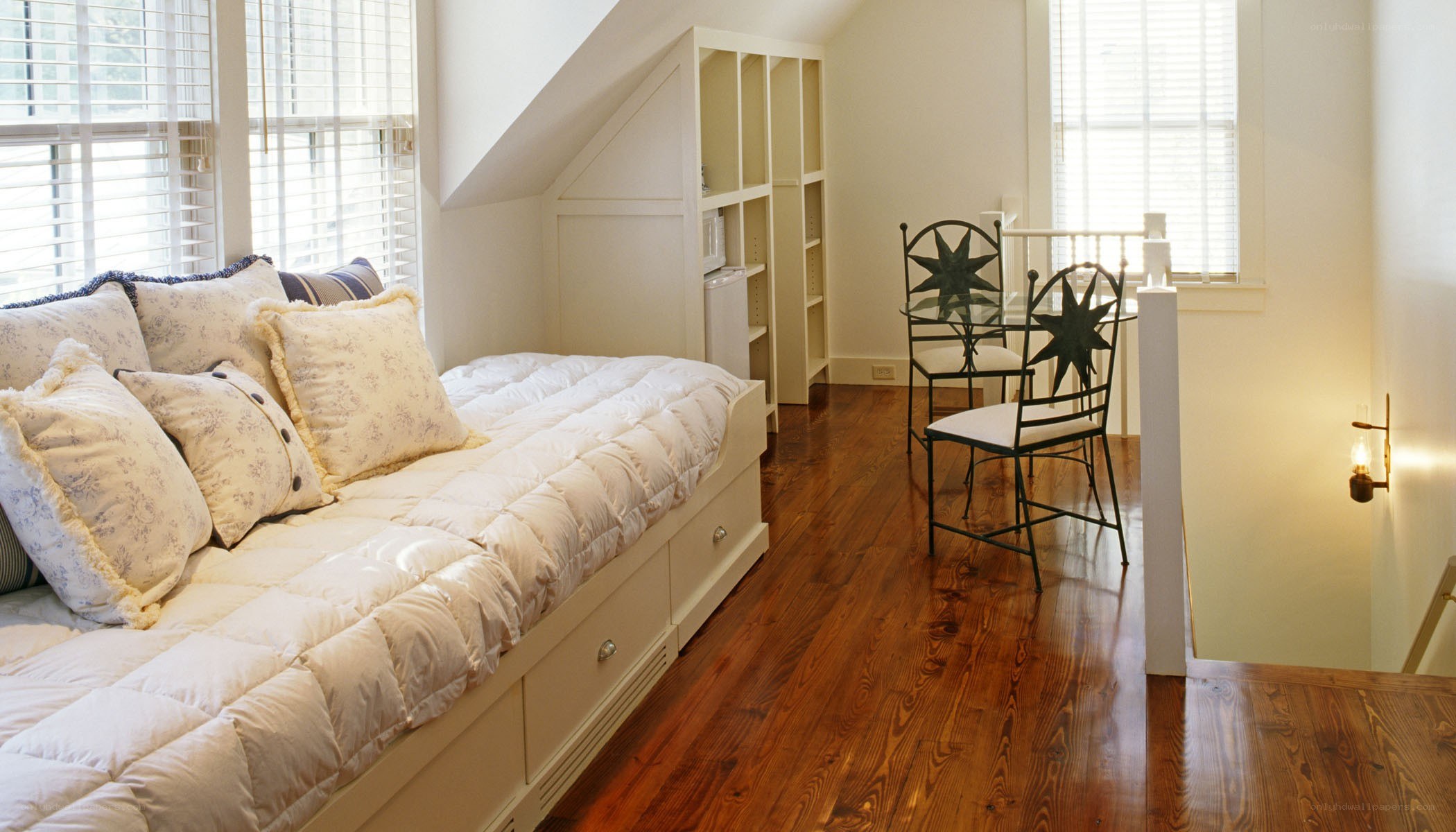 Attic bedroom with daybed and seating