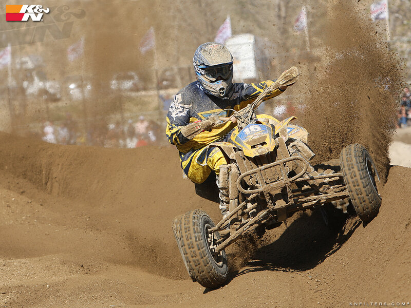 ATV racer on dirt track