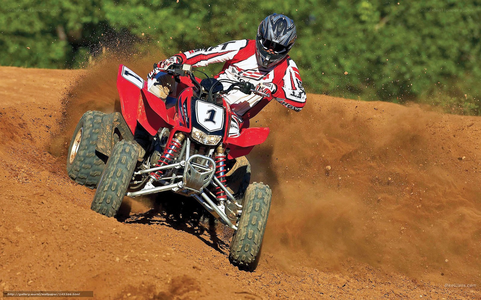 ATV racer on dirt track