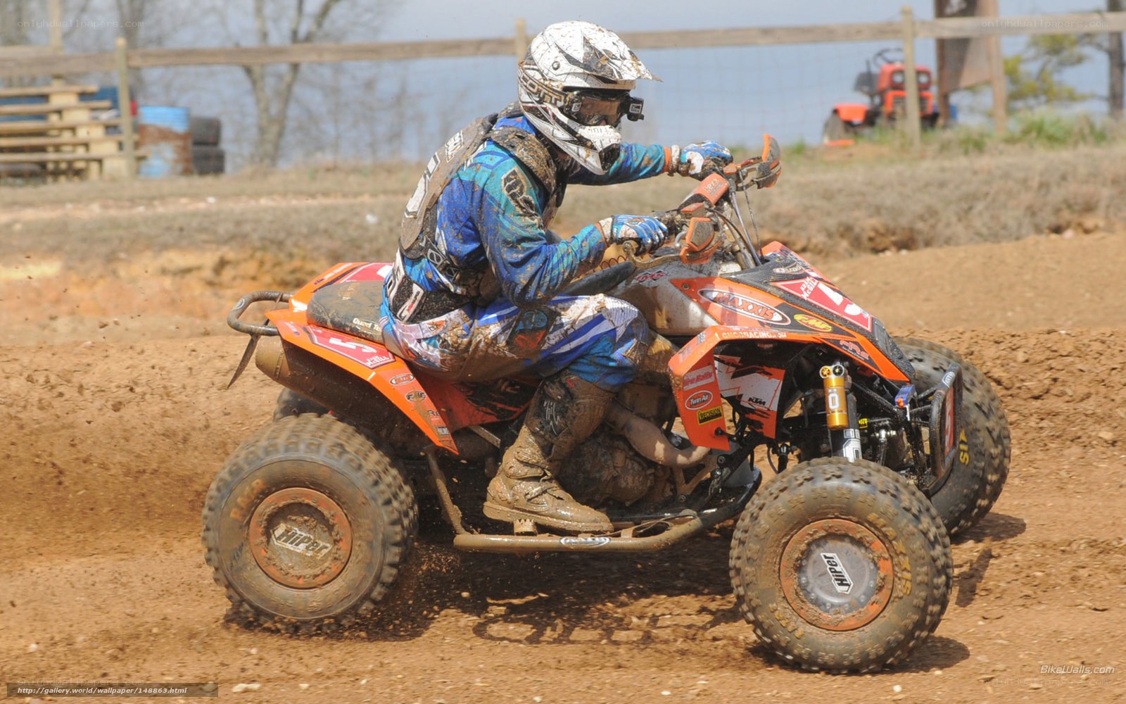 ATV racer on muddy track