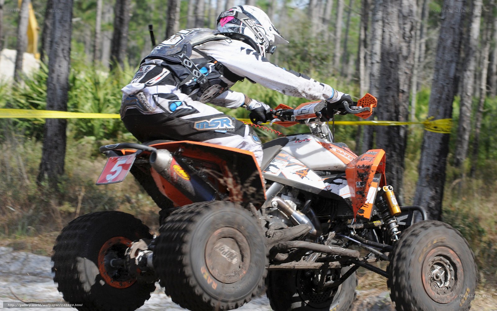 ATV rider in forest race