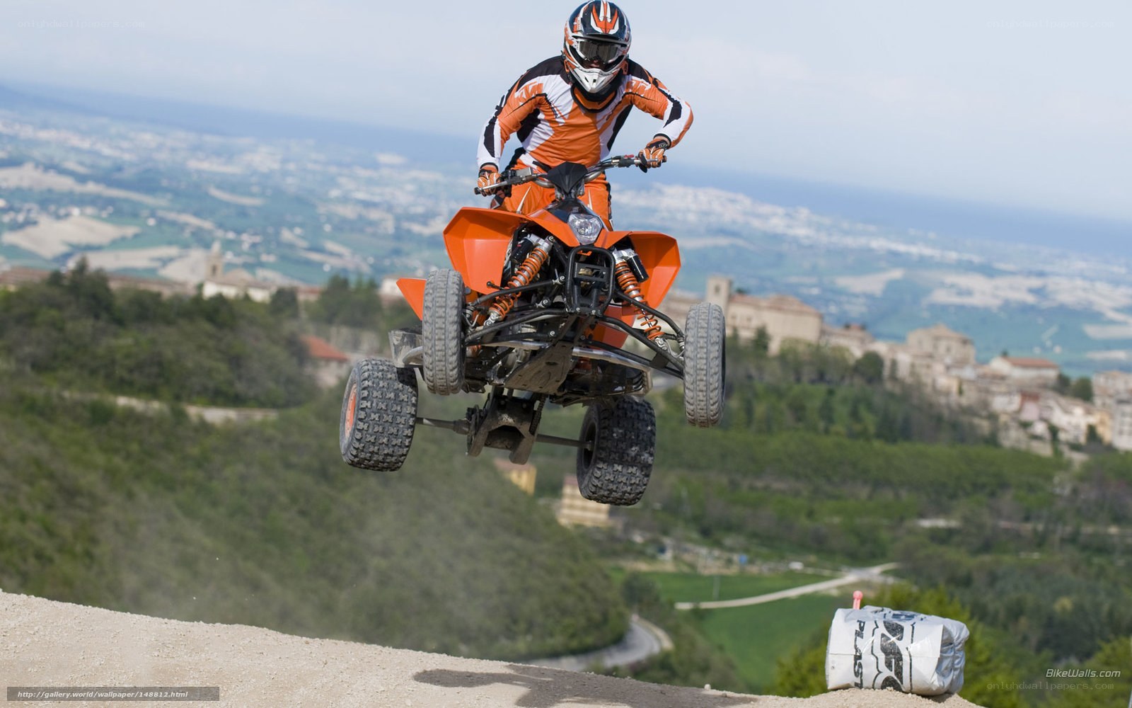 ATV rider in mid-air jump