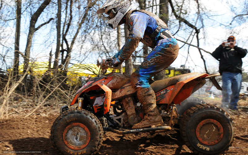 ATV rider in muddy race