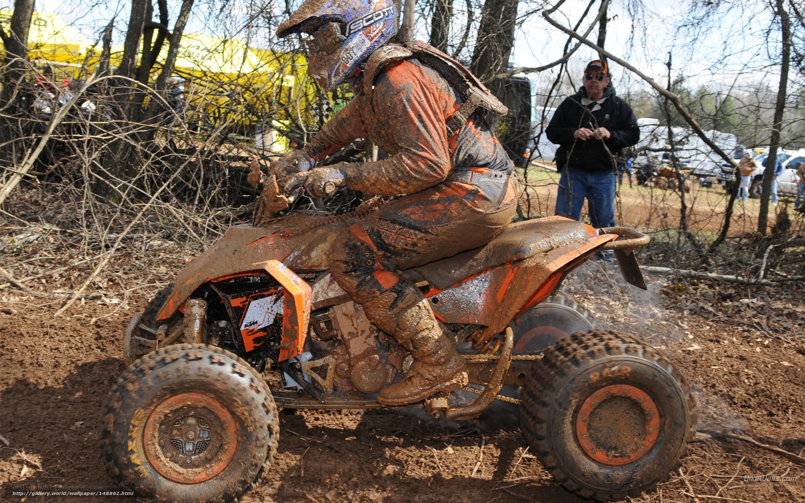 ATV rider in muddy terrain