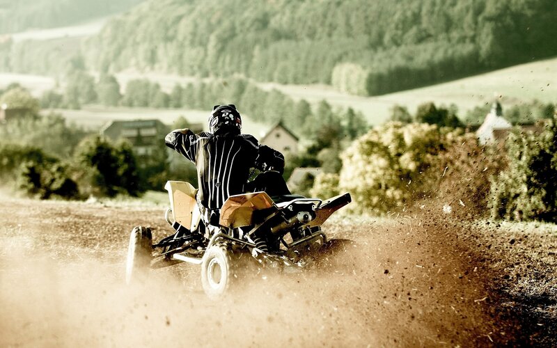 ATV rider on a dirt track