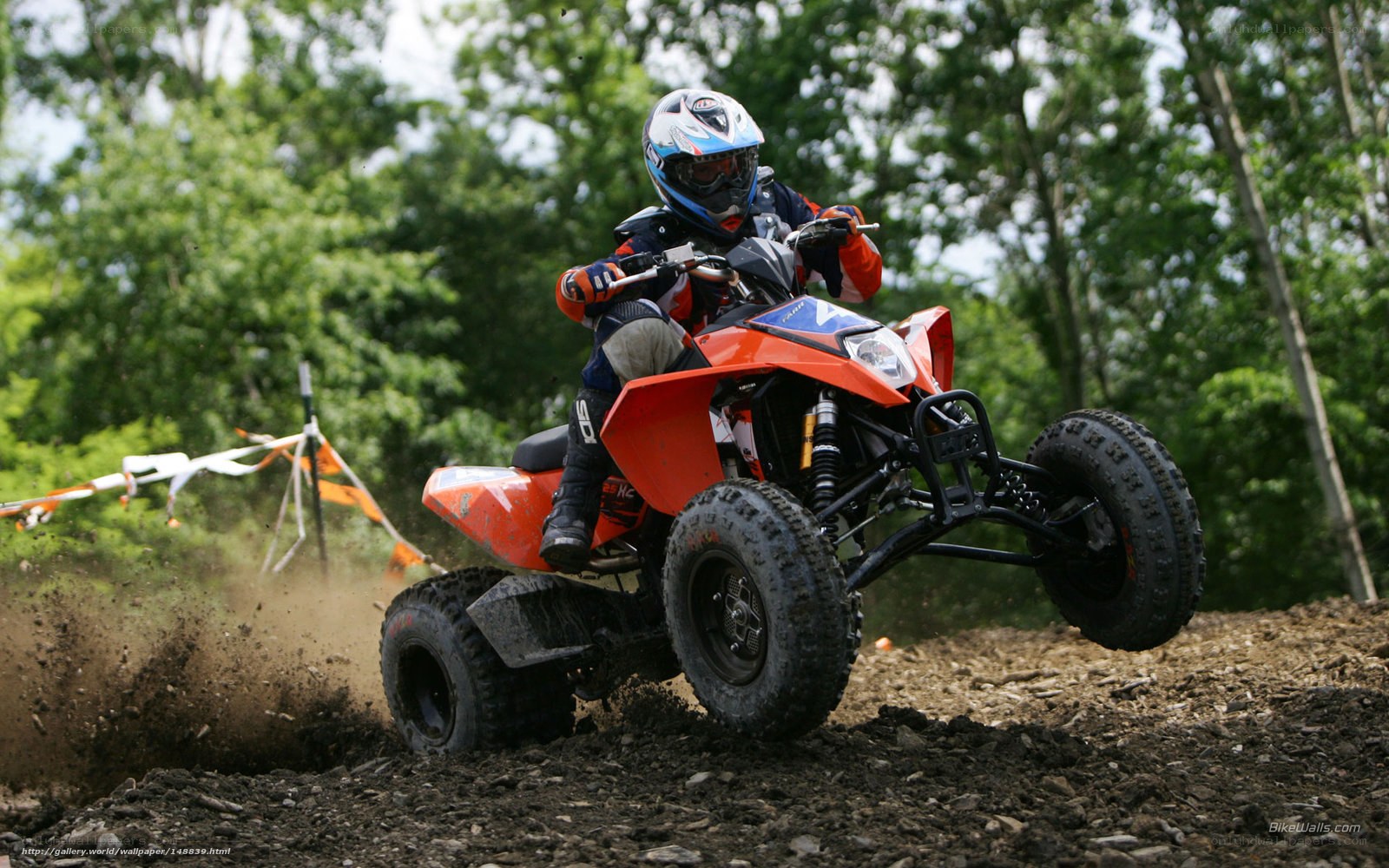 ATV rider on a dirt track