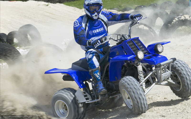ATV rider on dirt track