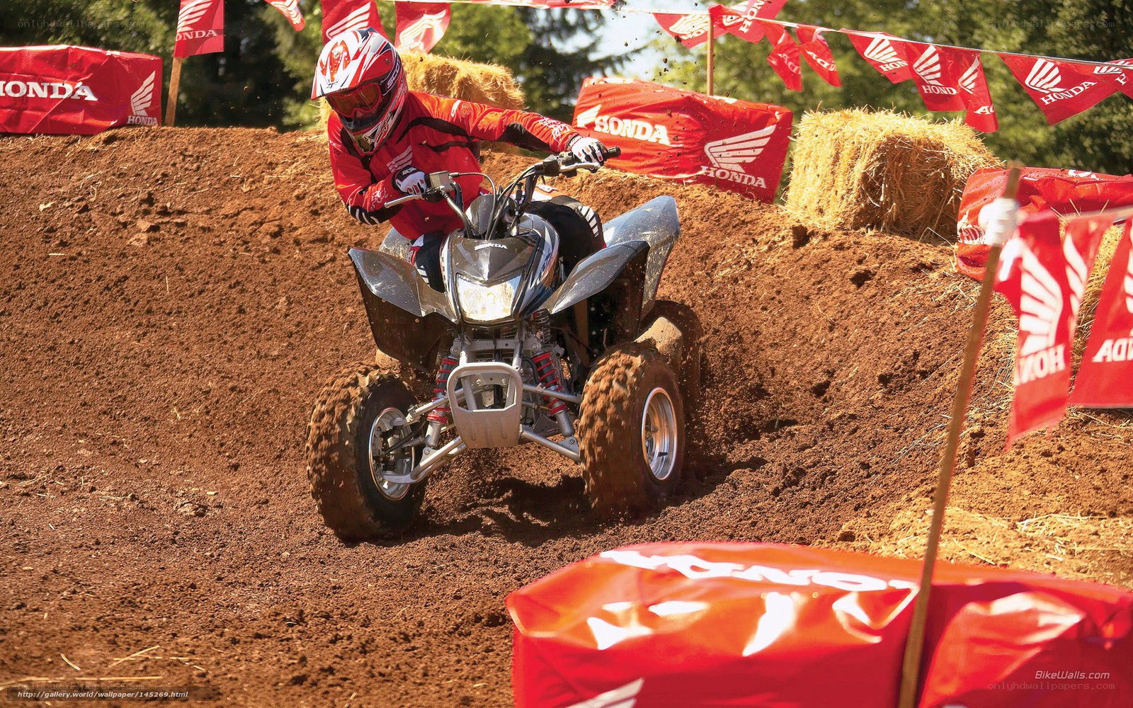 ATV rider on dirt track