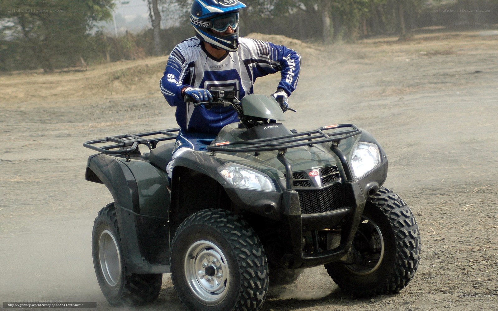 ATV rider on dirt track