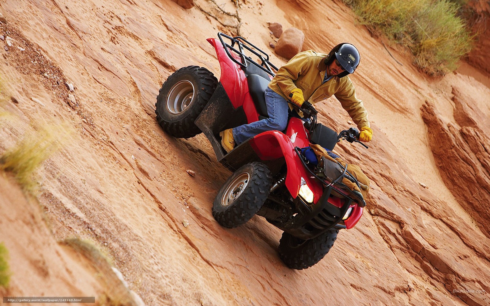 ATV rider on rocky slope