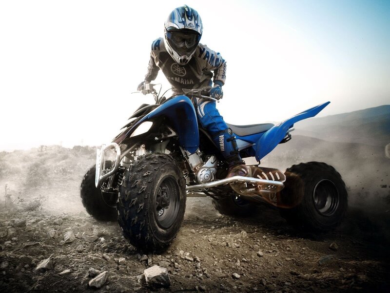 ATV rider on rocky terrain
