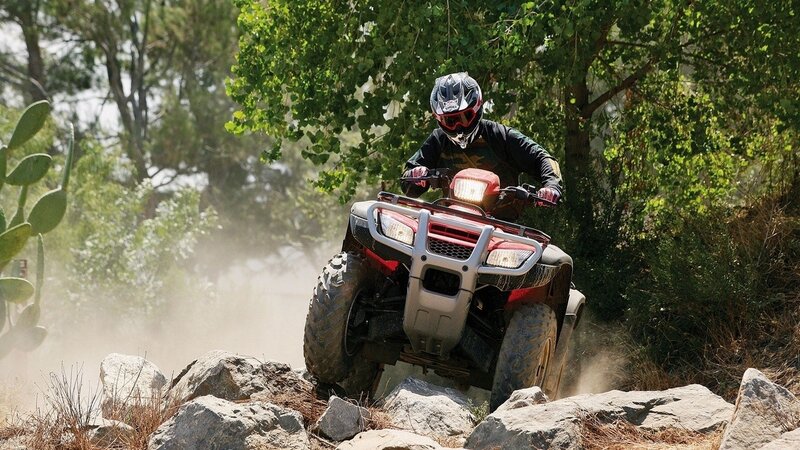 ATV rider on rocky trail