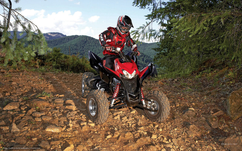 ATV rider on rocky trail