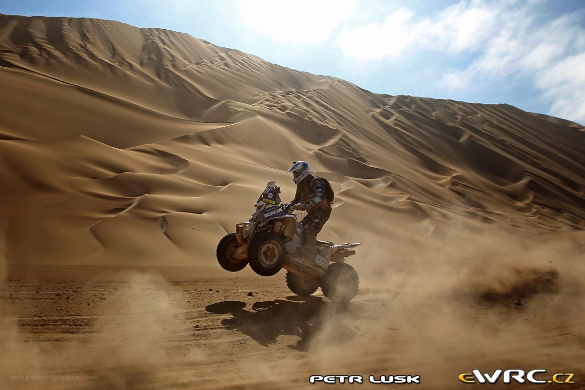 ATV rider on sand dunes