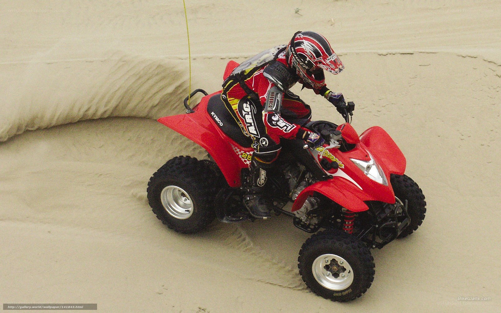 ATV rider on sand dunes