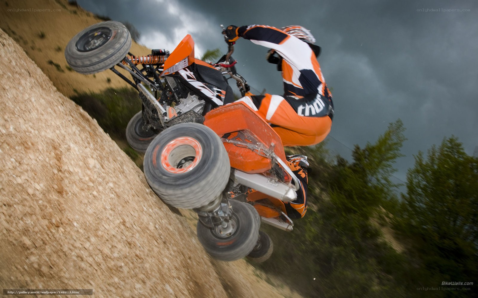 ATV rider on steep incline