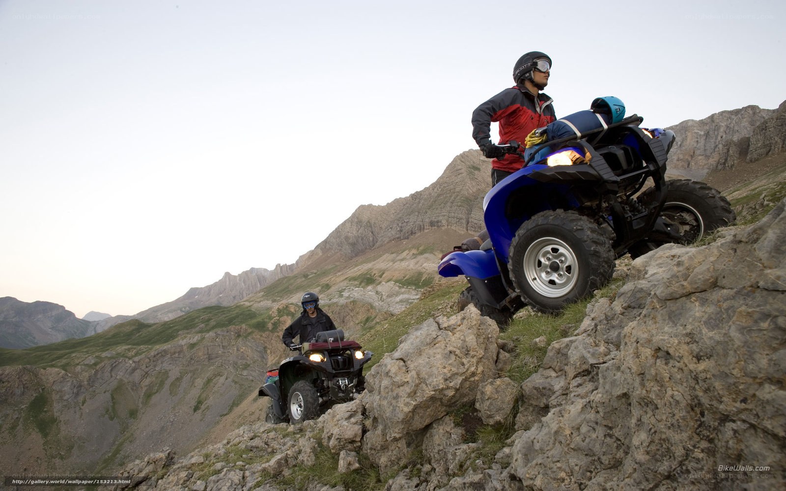 ATV riders on mountain trail