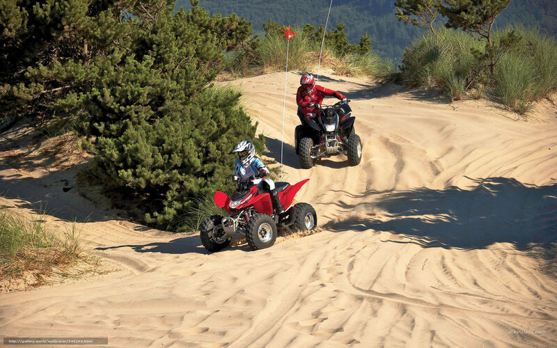 ATV riding on sand dunes