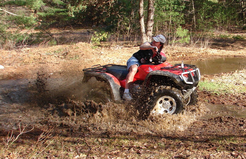 ATV riding through mud