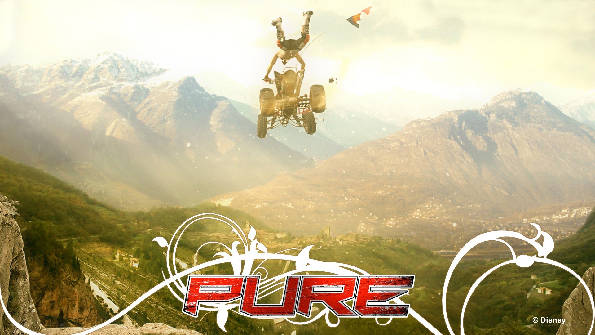 ATV stunt in mountainous landscape