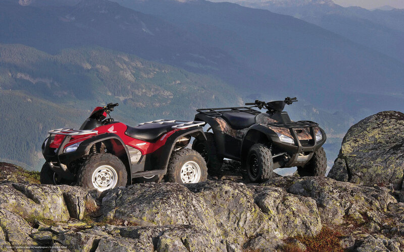 ATVs on a mountain peak