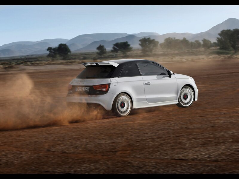 Audi A1 driving on dirt road