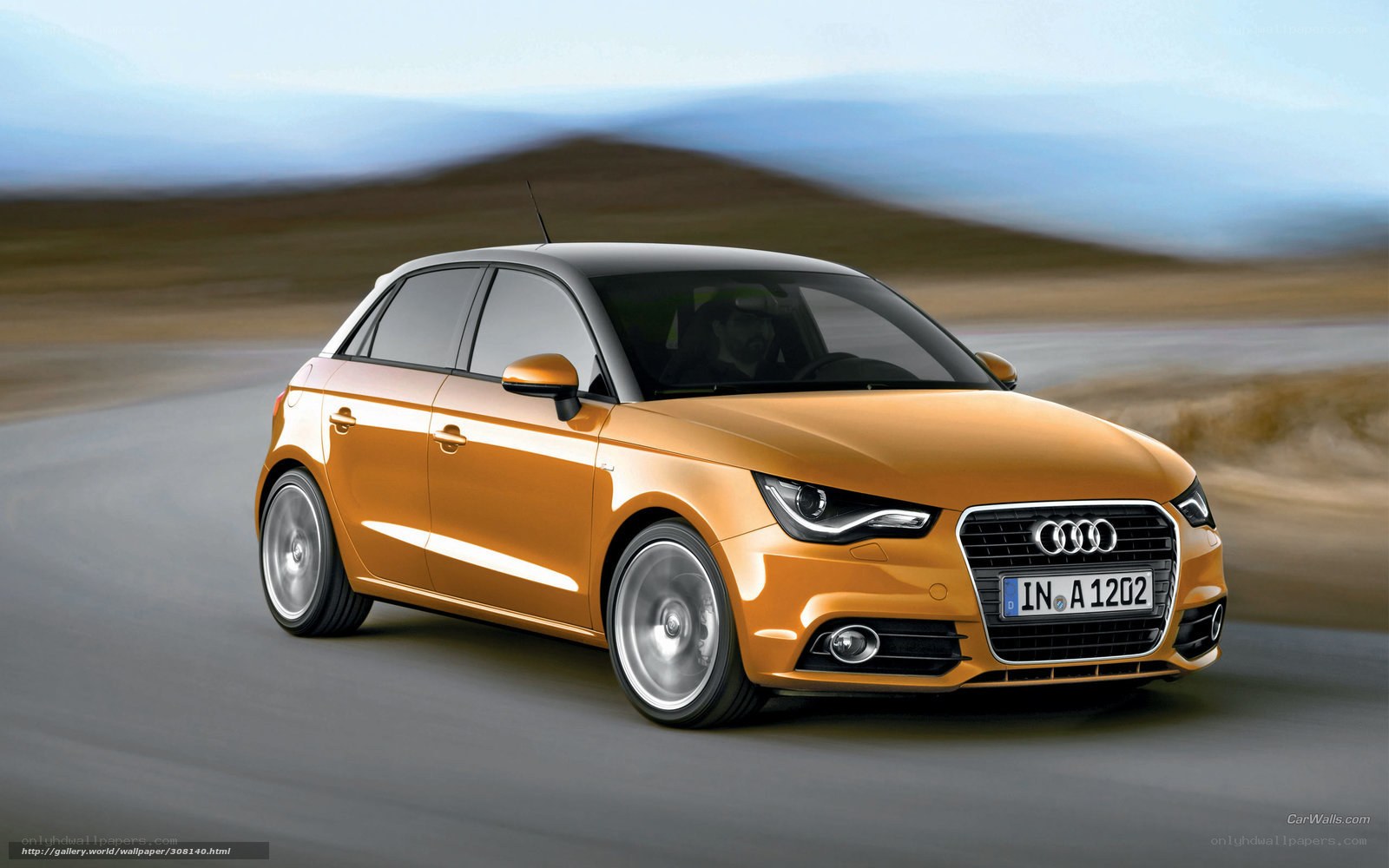 Audi A1 in motion on road