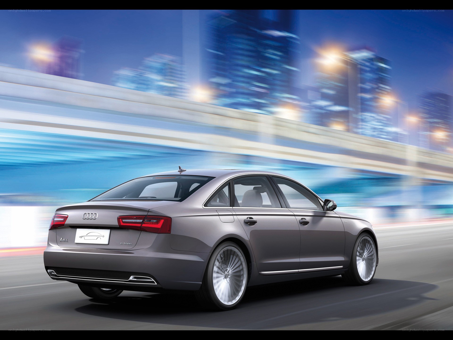 Audi A6 in motion at night